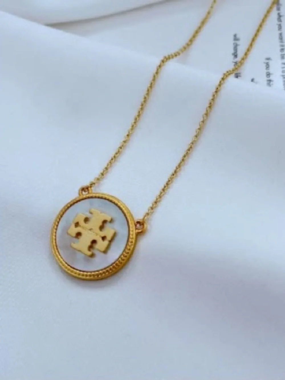 Tory Burch Gold-Tone Necklace with White Mother-of-Pearl Logo Pendant
